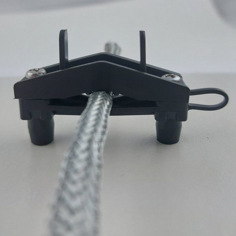 Strain Relief Clamp 21x18/2xø7mm fixed by selftaping screws 4.2x19mm Strain Relief Clamp 21x18/2xø7mm fixed by selftaping screws 4.2x19mm